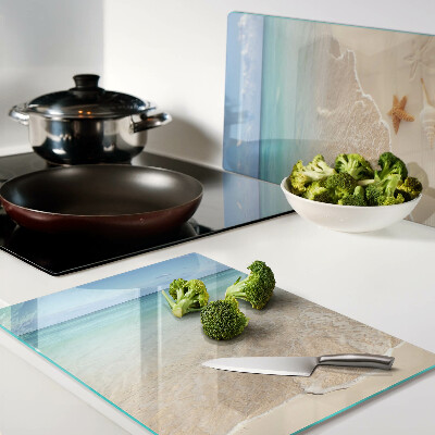 Deska kuchenna szklana Plaża z muszlami i falami