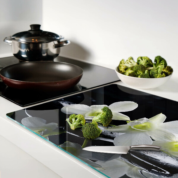 Tabla de cocina Orquídeas sobre fondo negro