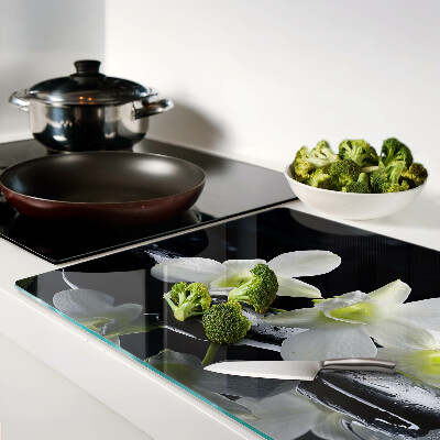 Tabla de cocina Orquídeas sobre fondo negro