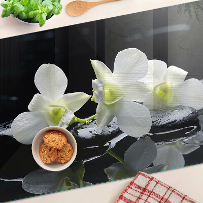 Tabla de cocina Orquídeas sobre fondo negro