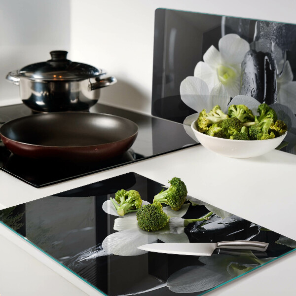 Tabla de cocina Orquídeas sobre fondo negro