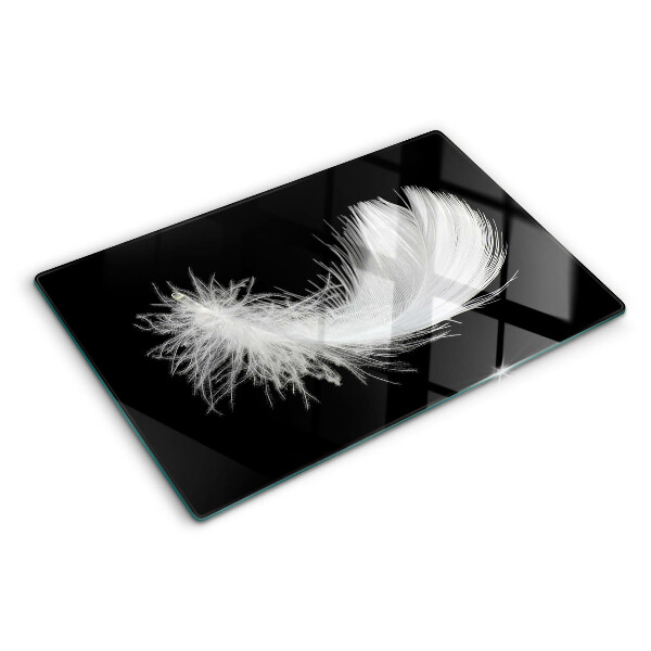 Tabla de cortar de cristal Pluma sobre fondo negro