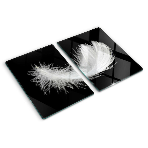 Tabla de cortar de cristal Pluma sobre fondo negro