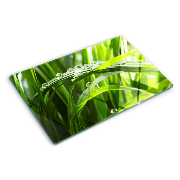 Tabla de cocina Gotas de agua sobre la hierba