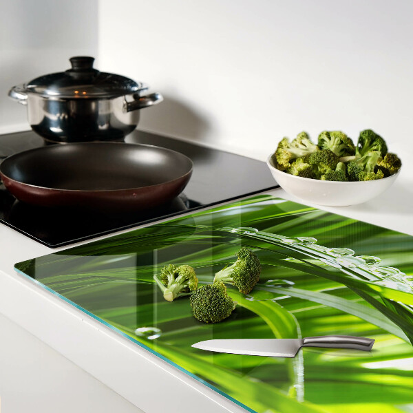 Tabla de cocina Gotas de agua sobre la hierba