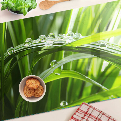 Tabla de cocina Gotas de agua sobre la hierba