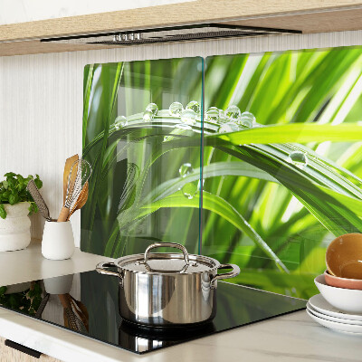 Tabla de cocina Gotas de agua sobre la hierba