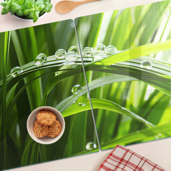 Tabla de cocina Gotas de agua sobre la hierba