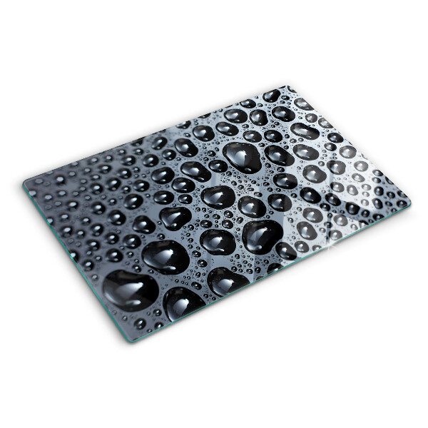 Tabla de cortar de cristal Gotas de agua sobre el vidrio