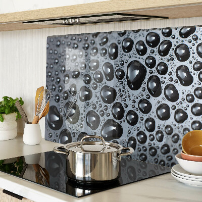 Tabla de cortar de cristal Gotas de agua sobre el vidrio