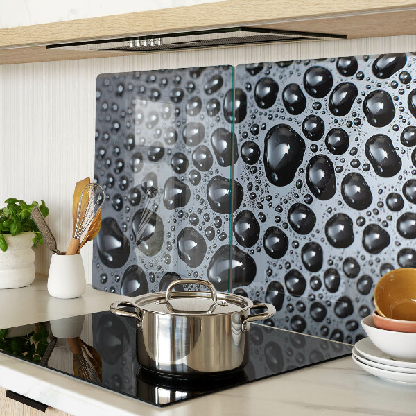 Tabla de cortar de cristal Gotas de agua sobre el vidrio