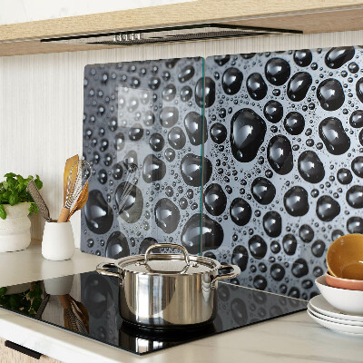 Tabla de cortar de cristal Gotas de agua sobre el vidrio