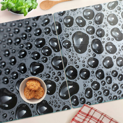 Tabla de cortar de cristal Gotas de agua sobre el vidrio
