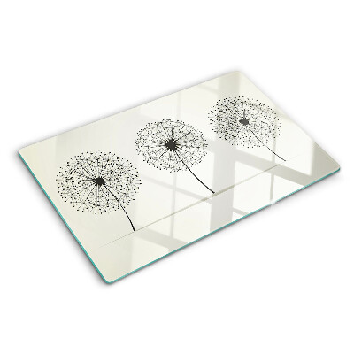 Tabla de cortar Dientes de león sobre un fondo blanco