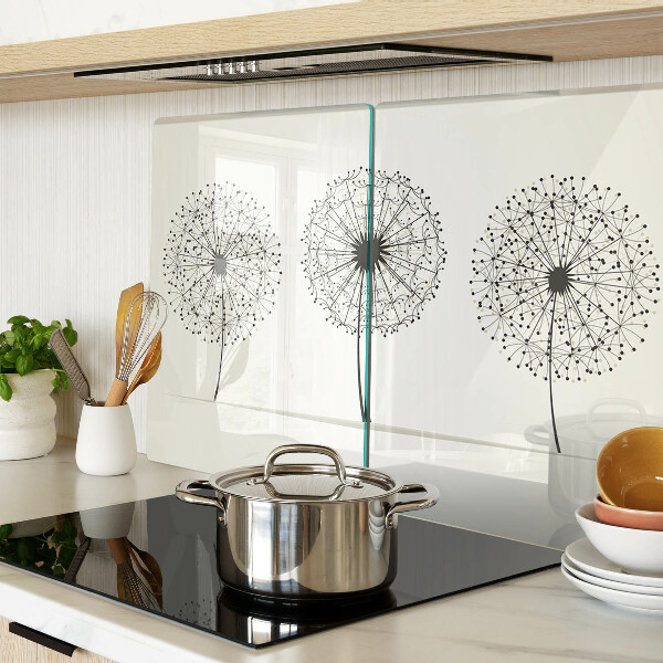 Tabla de cortar Dientes de león sobre un fondo blanco