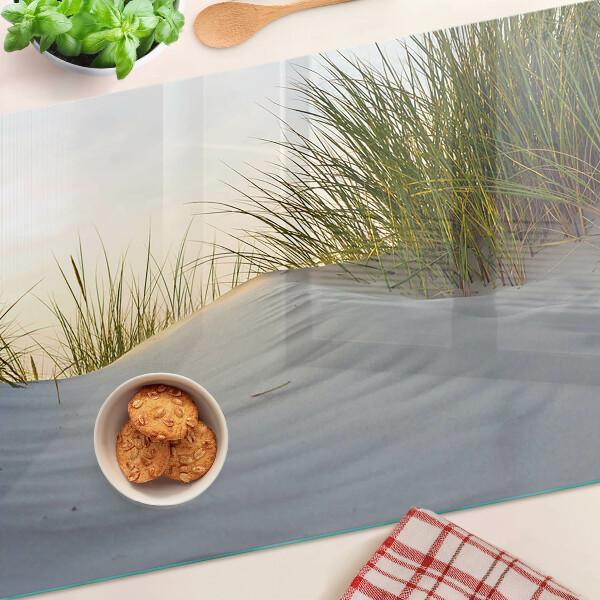 Tabla para cortar Hierba verde contra el cielo