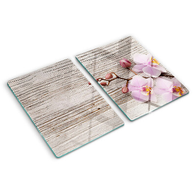 Tabla de cortar Orquídeas sobre un fondo de madera