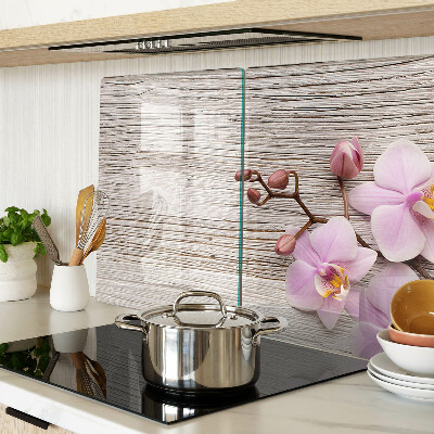 Tabla de cortar Orquídeas sobre un fondo de madera