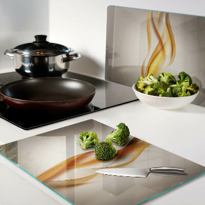 Szklana deska kuchenna Fale w odcieniach złota