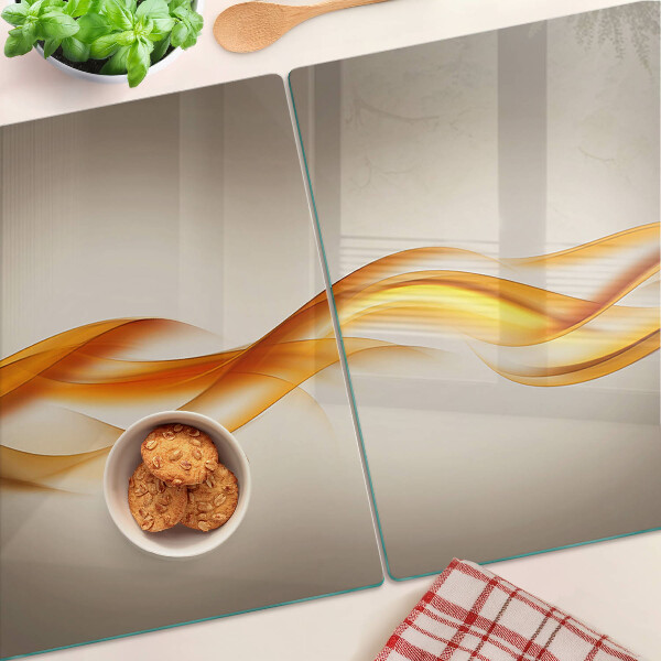 Szklana deska kuchenna Fale w odcieniach złota