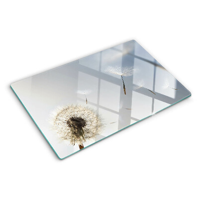 Deska kuchenna szklana Dmuchawce na tle okna