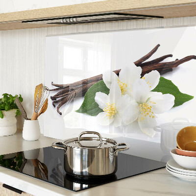 Tabla de cortar flores y vainas de vainilla