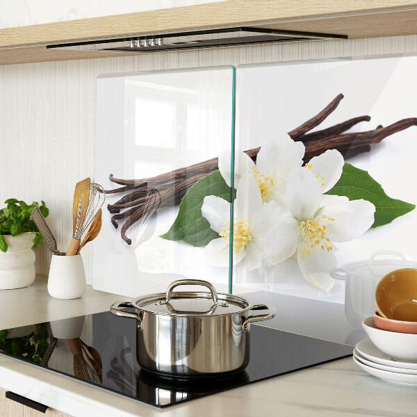 Tabla de cortar flores y vainas de vainilla