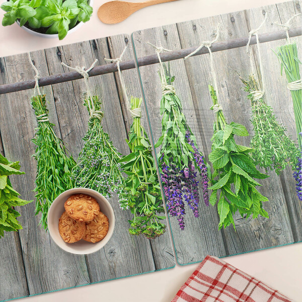 Szklana deska kuchenna Suszone zioła na tle drewna