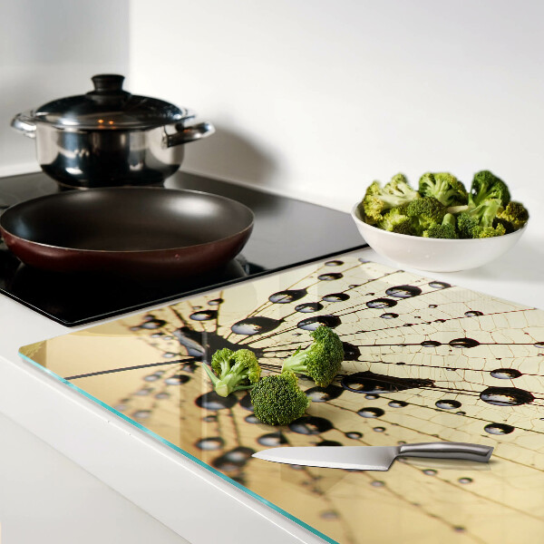 Tabla de cortar de cristal Gotas de agua sobre una telaraña