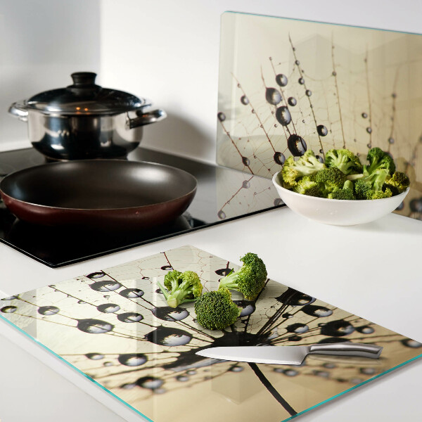 Tabla de cortar de cristal Gotas de agua sobre una telaraña