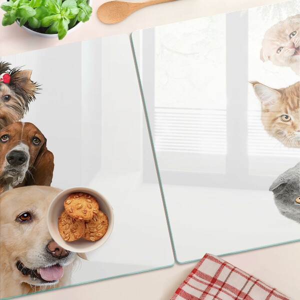 Tabla de cortar de cristal Perros y gatos en diferentes poses.