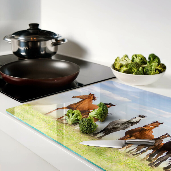 Tabla para cortar Caballos al galope en el prado