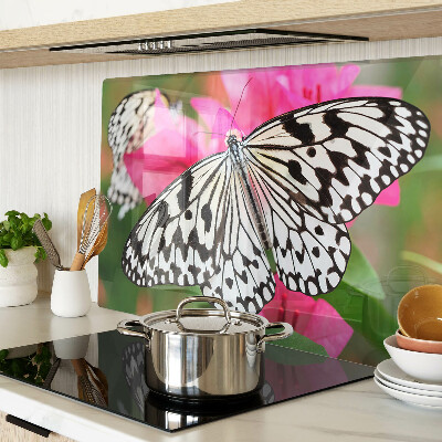 Tabla de cortar de cristal Mariposa sobre flores
