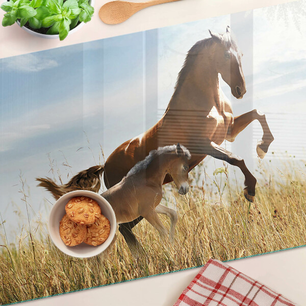 Tabla de cocina Caballos en un prado al sol