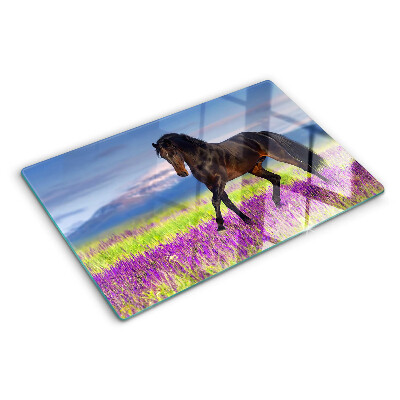 Tabla de cortar de cristal Un caballo sobre un fondo de flores violetas.