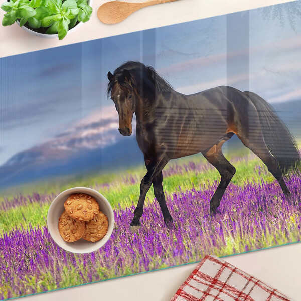Tabla de cortar de cristal Un caballo sobre un fondo de flores violetas.