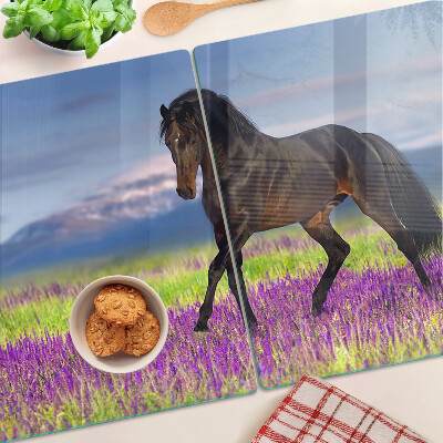 Tabla de cortar de cristal Un caballo sobre un fondo de flores violetas.