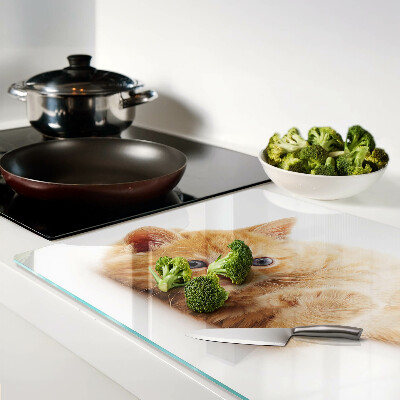 Tabla de cortar de cristal Gatito pelirrojo sobre un fondo blanco