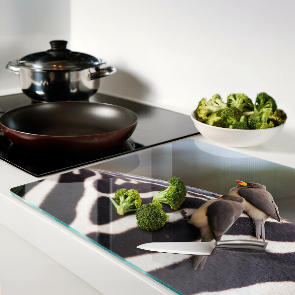 Tabla de cortar de cristal Pájaros en una cebra