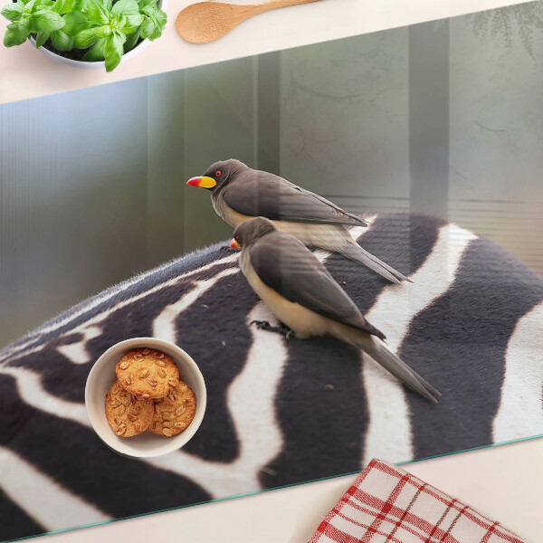 Tabla de cortar de cristal Pájaros en una cebra