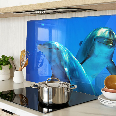 Tabla de cortar de cristal Delfines en el agua