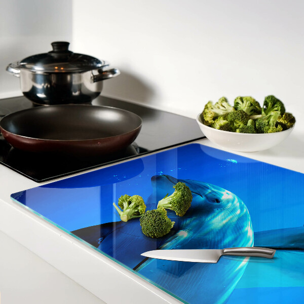 Tabla de cortar de cristal Delfines en el agua