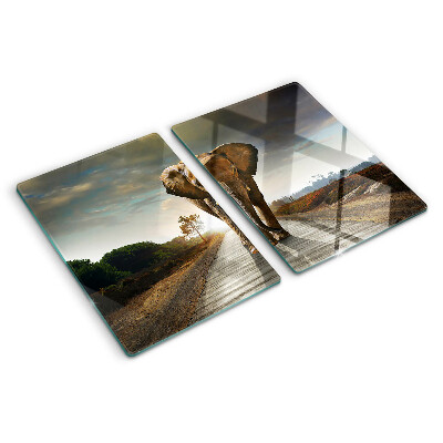 Tabla de cortar de cristal Elefante en la carretera al atardecer