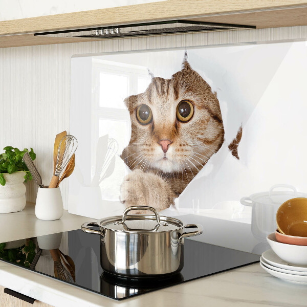 Tabla para cortar Un gato saliendo de un agujero