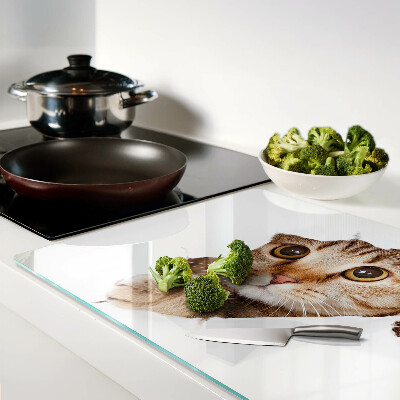 Tabla para cortar Un gato saliendo de un agujero