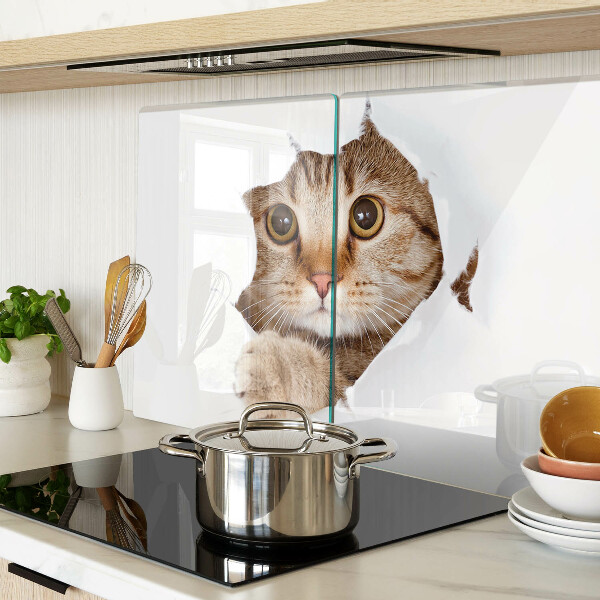 Tabla para cortar Un gato saliendo de un agujero