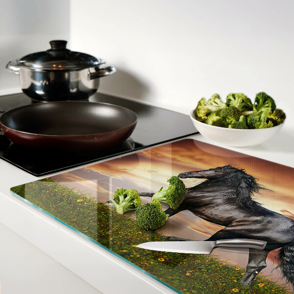 Tabla de cocina Un caballo con el sol poniente como telón de fondo
