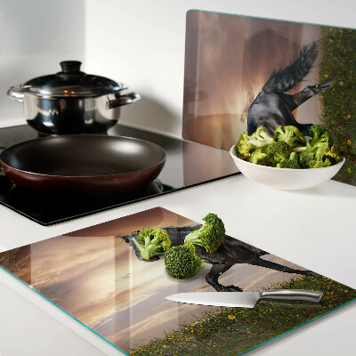 Tabla de cocina Un caballo con el sol poniente como telón de fondo