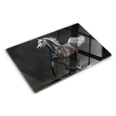 Tabla para cortar Un caballo moteado en fuga