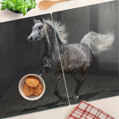 Tabla para cortar Un caballo moteado en fuga